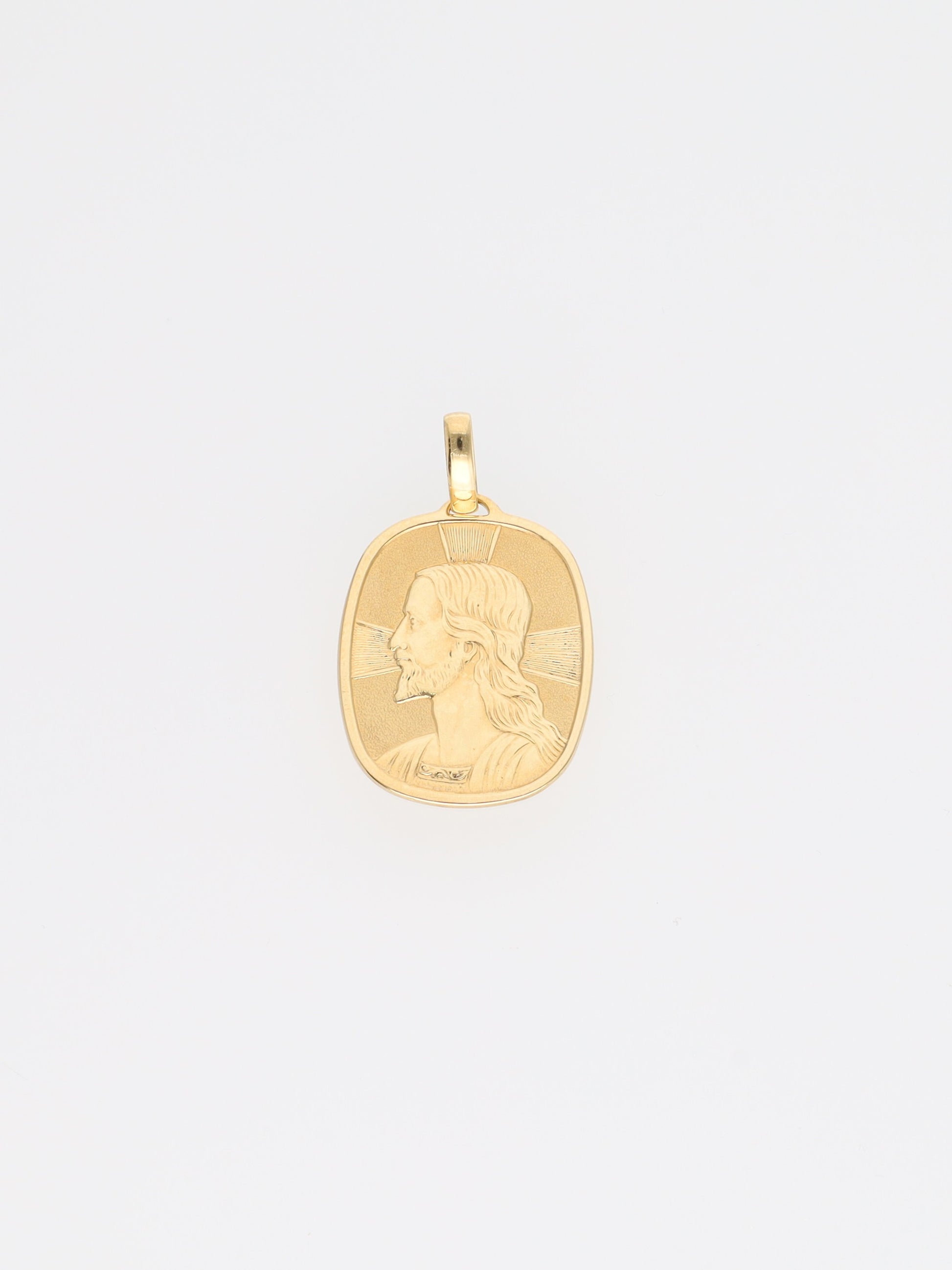 Ciondolo volto di Cristo oro giallo 18kt