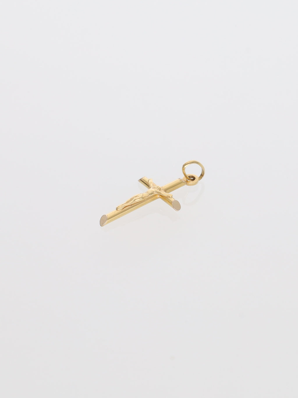 Ciondolo crocifisso in oro giallo 18kt