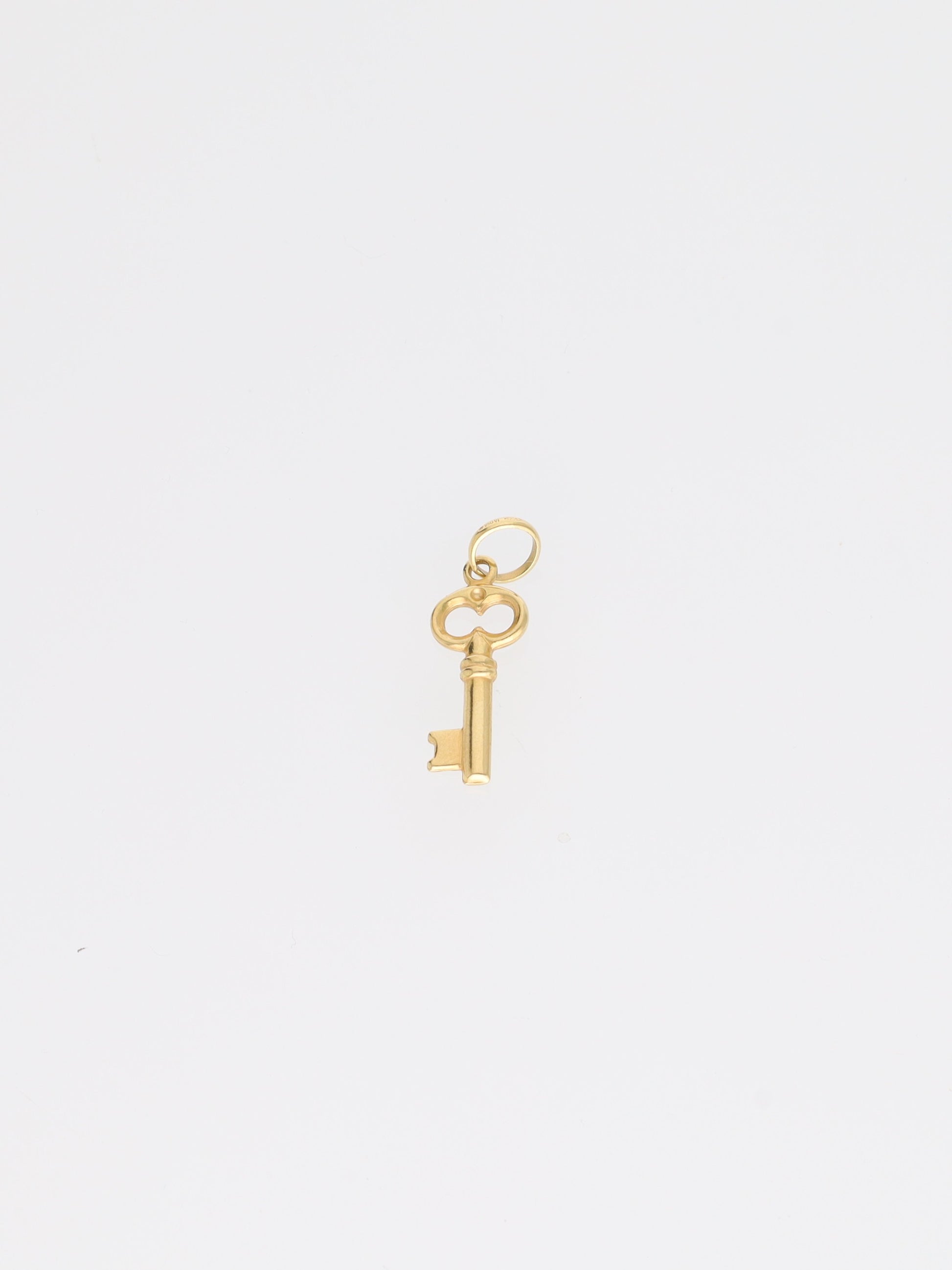 Ciondolo chiave portafortuna in oro giallo 18kt