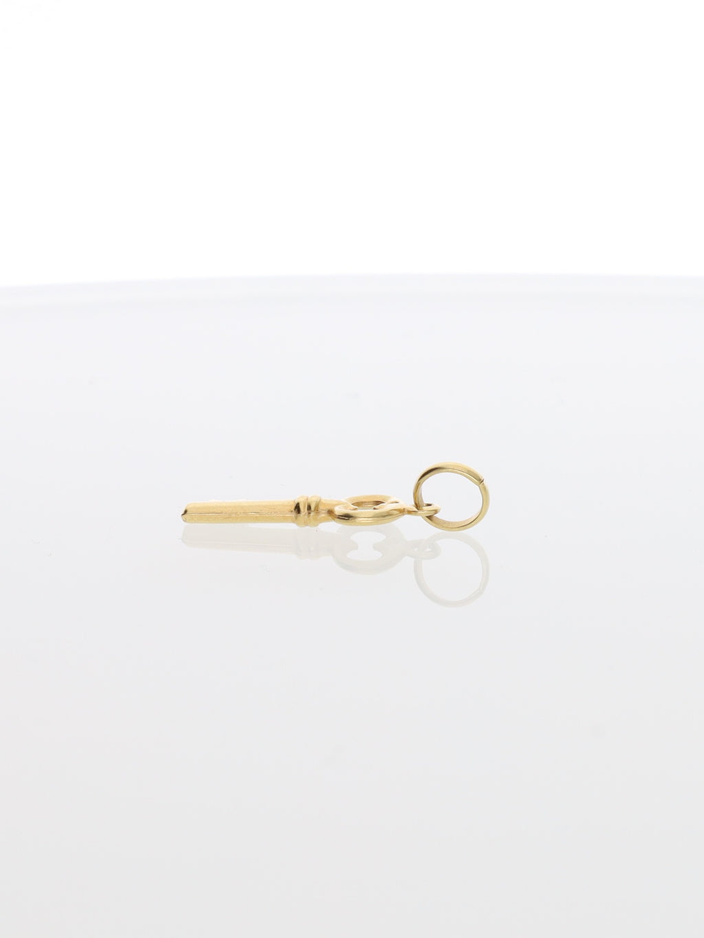 Ciondolo chiave portafortuna in oro giallo 18kt