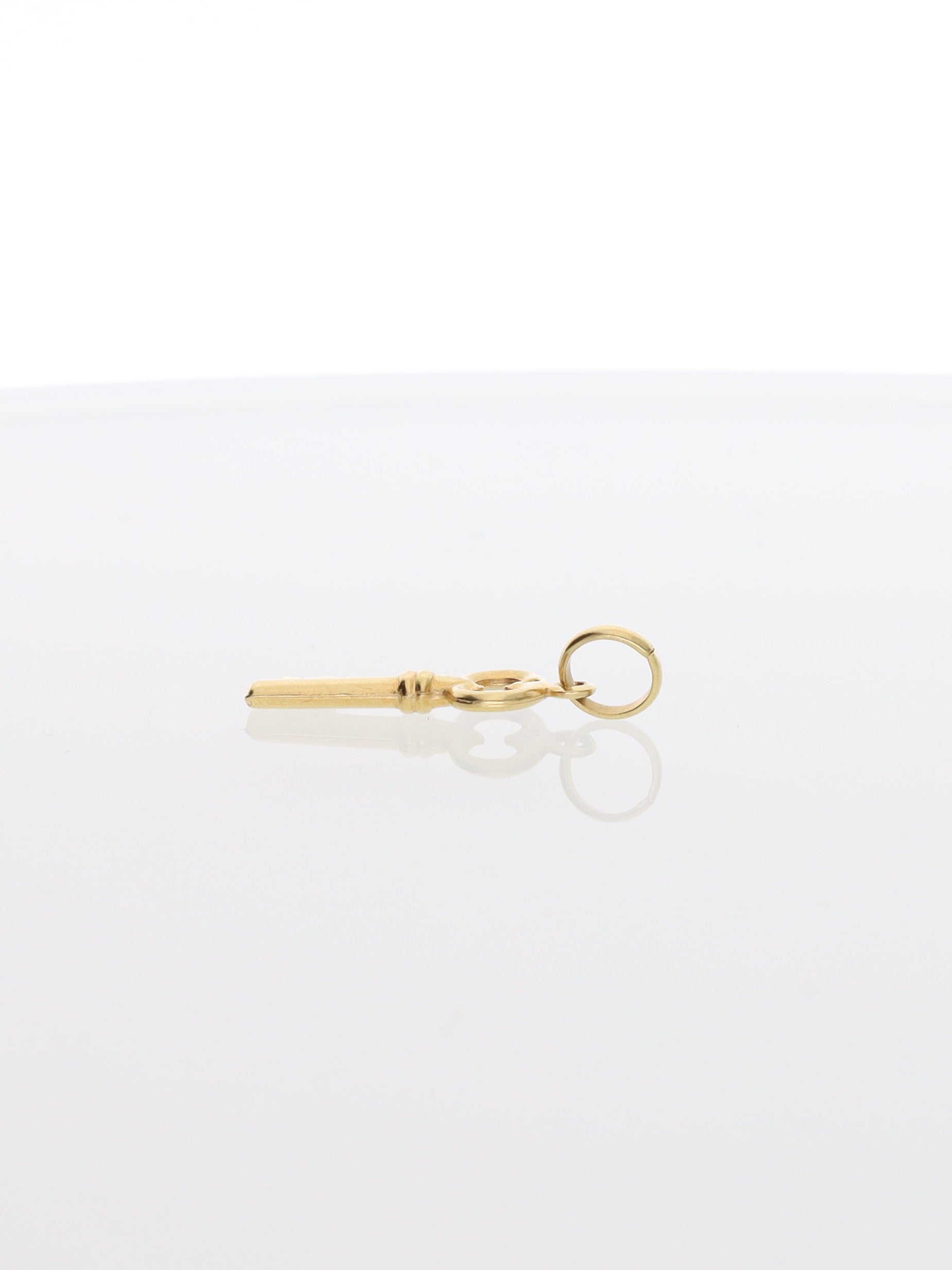 Ciondolo chiave portafortuna in oro giallo 18kt