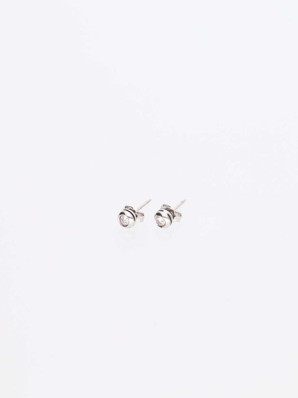 Orecchini punto luce Oro Bianco 18kt - Diamante 0.12ct