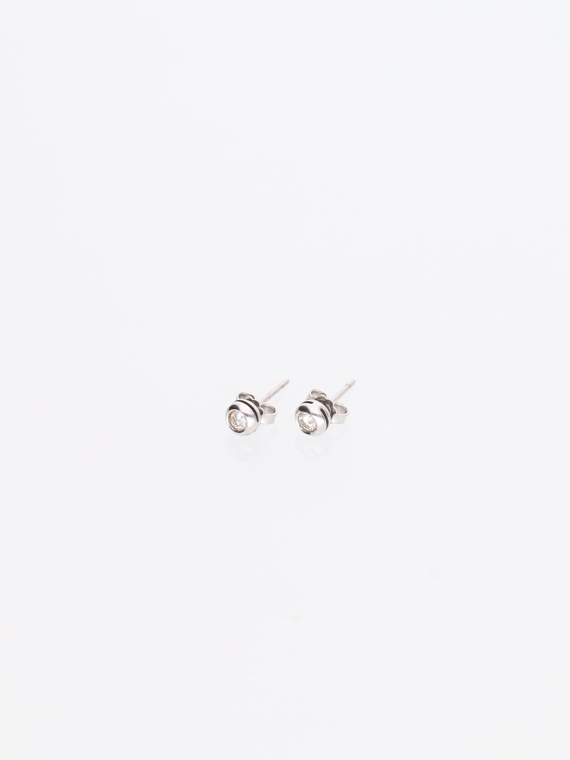 Orecchini punto luce Oro Bianco 18kt - Diamante 0.12ct