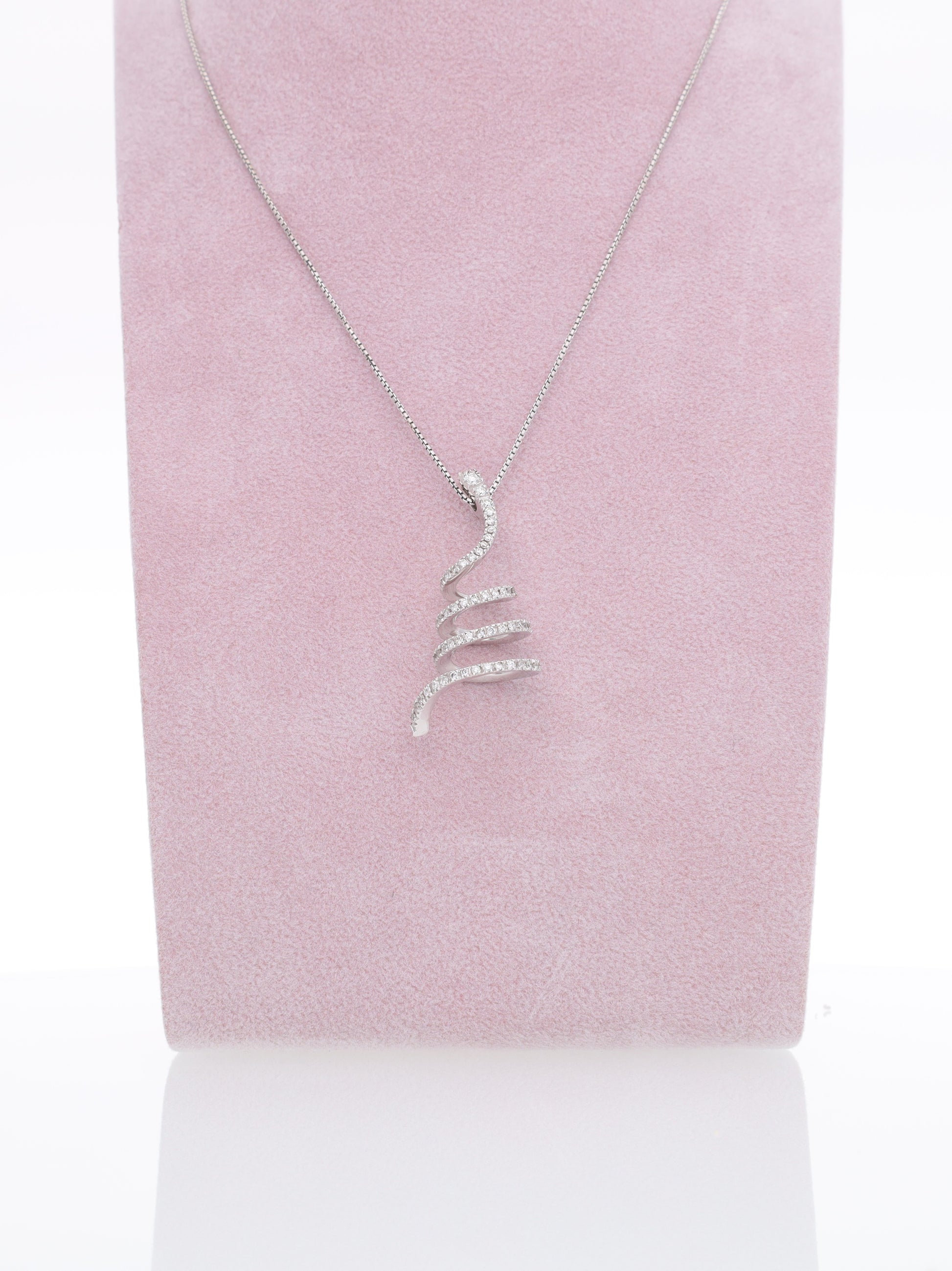 Catenina in oro bianco 18kt con ciondolo a spirale e diamanti