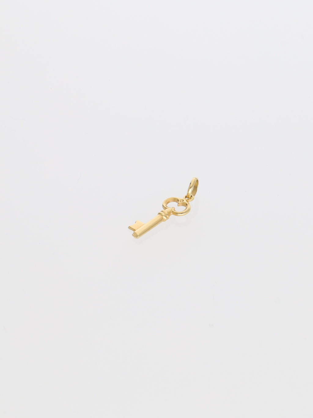 Ciondolo chiave portafortuna in oro giallo 18kt