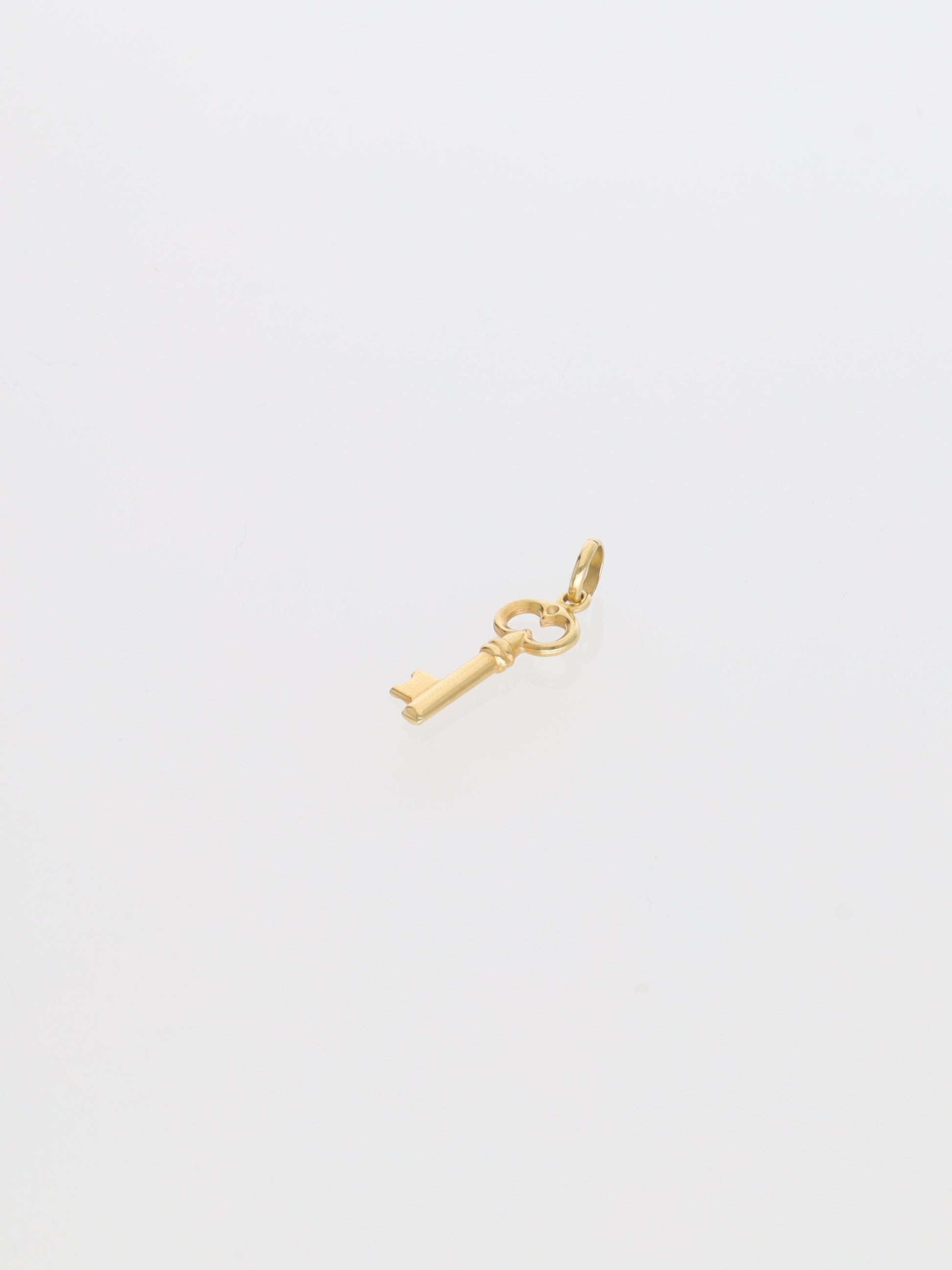 Ciondolo chiave portafortuna in oro giallo 18kt