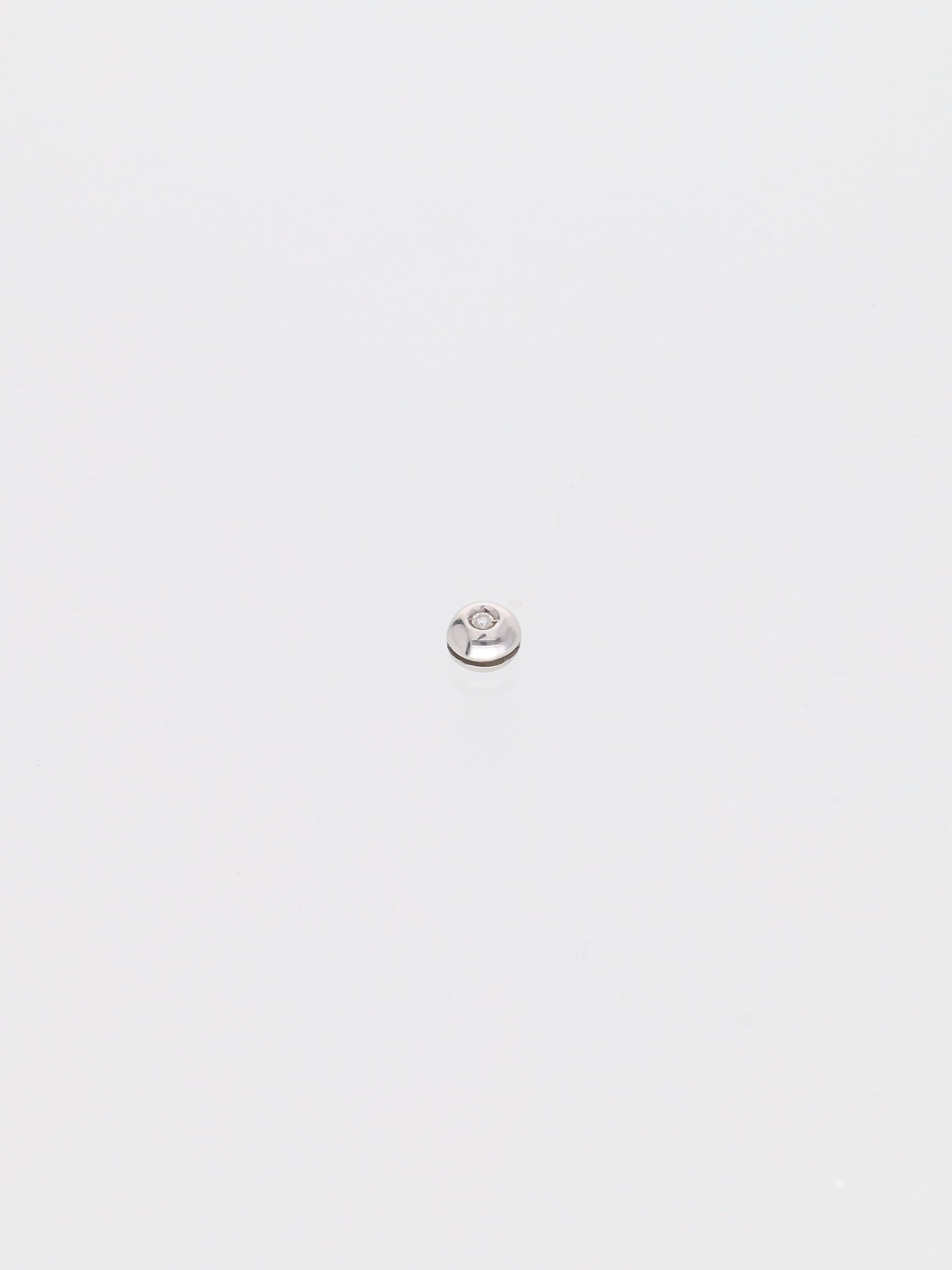 Ciondolo in oro bianco 18kt punto luce 0.03ct
