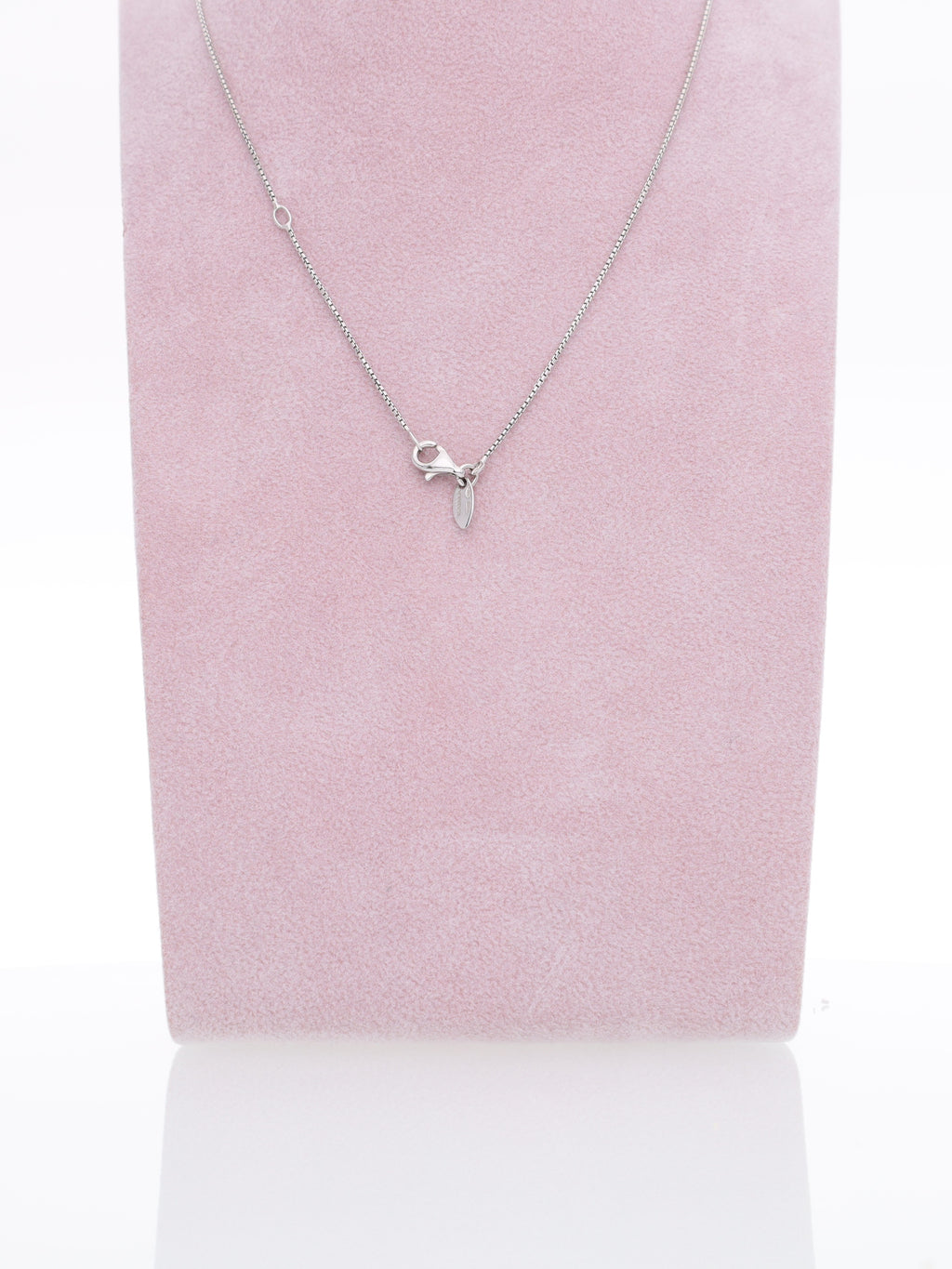 Catenina in oro bianco 18kt con ciondolo a spirale e diamanti