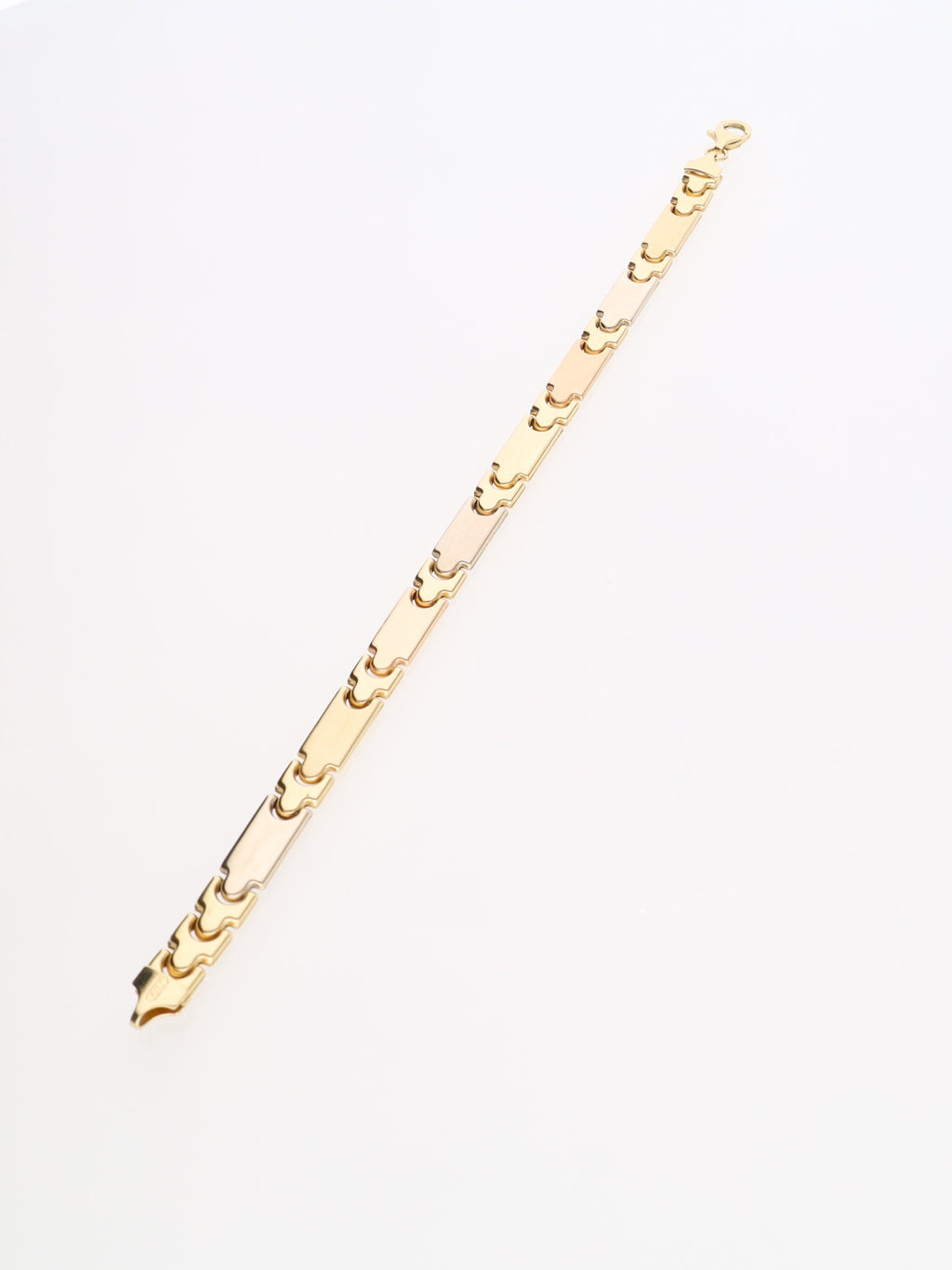 Bracciale a piastre in Oro Giallo Bianco e Rosa