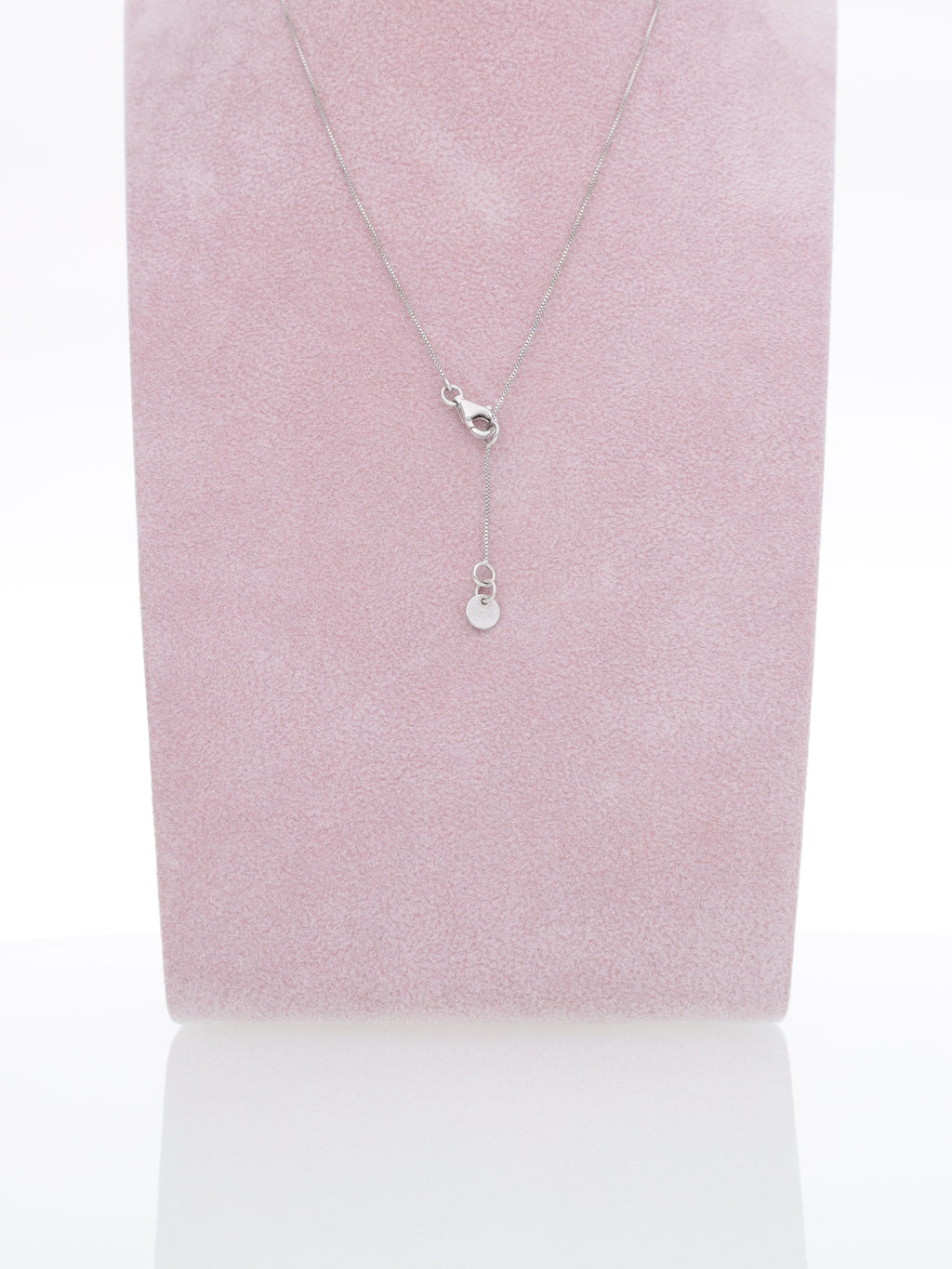 Catenina in oro bianco 18kt con punto luce - Diamante 0.08ct