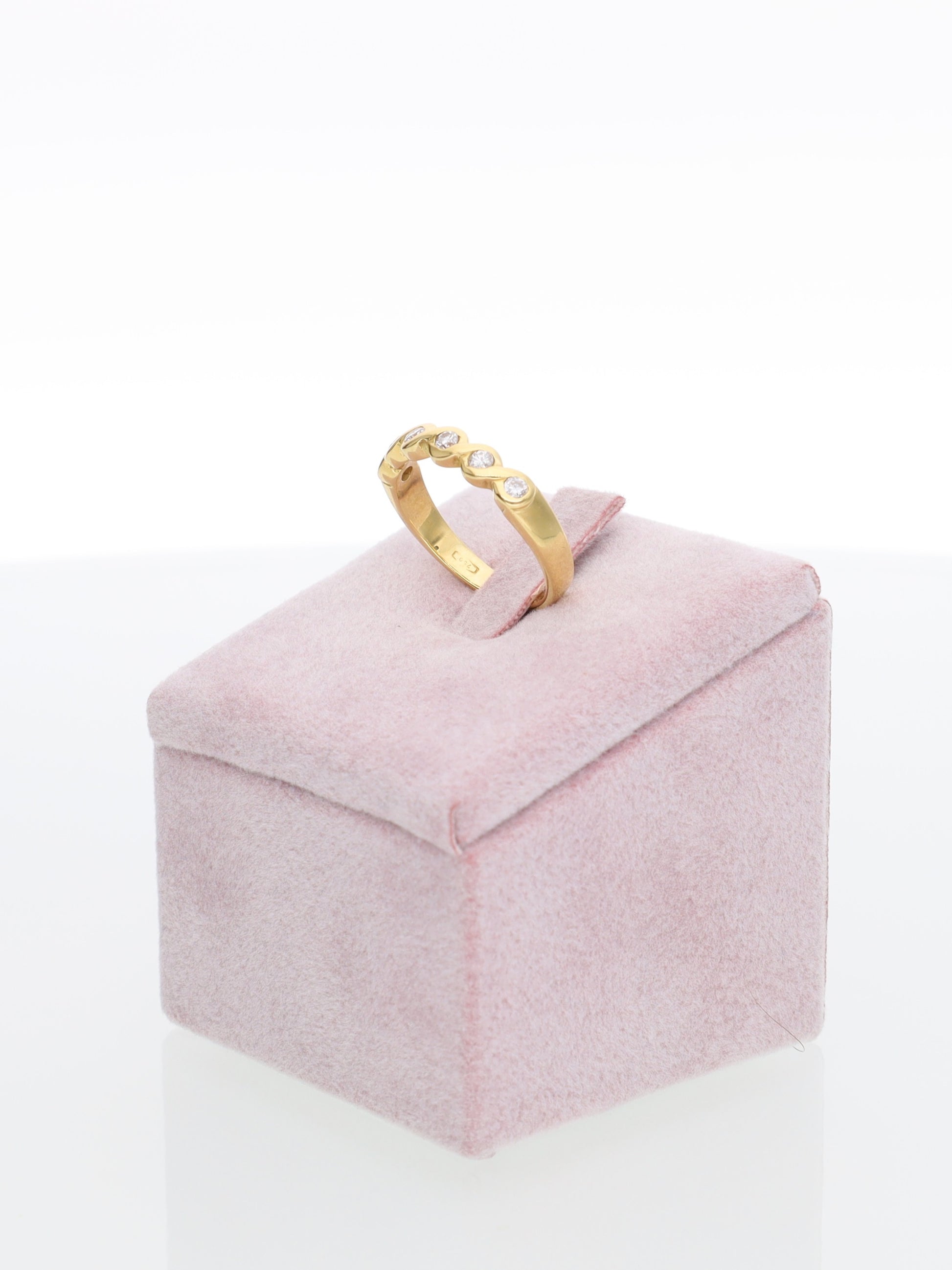 Anello veretta oro giallo con fascia intrecciata di Diamanti