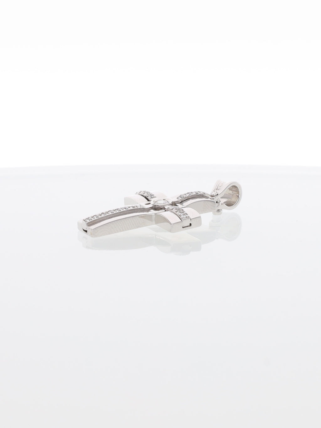 Ciondolo croce in oro bianco 18kt con zirconi