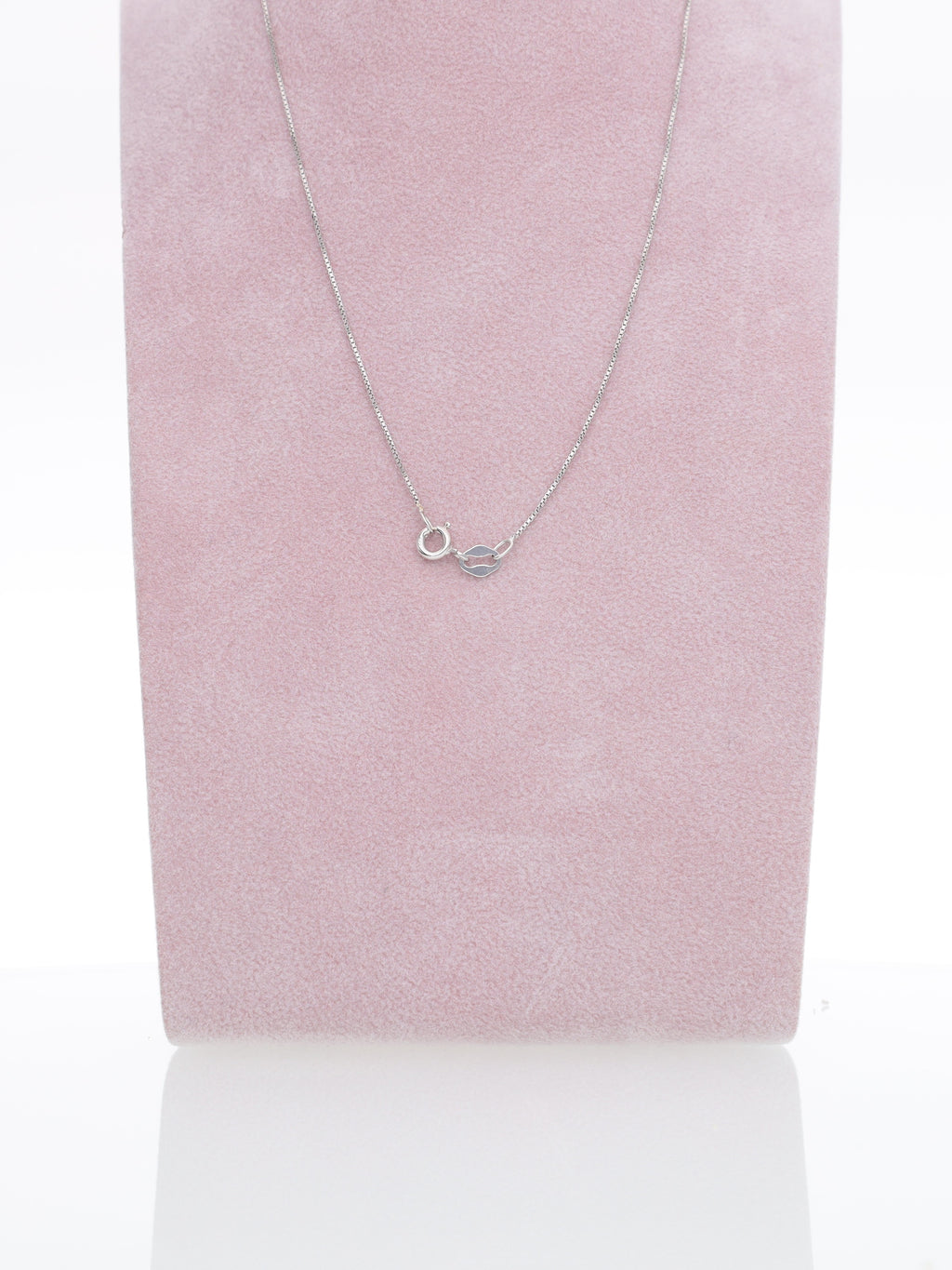 Catenina in oro bianco 18kt con punto luce - Diamante 0.10ct