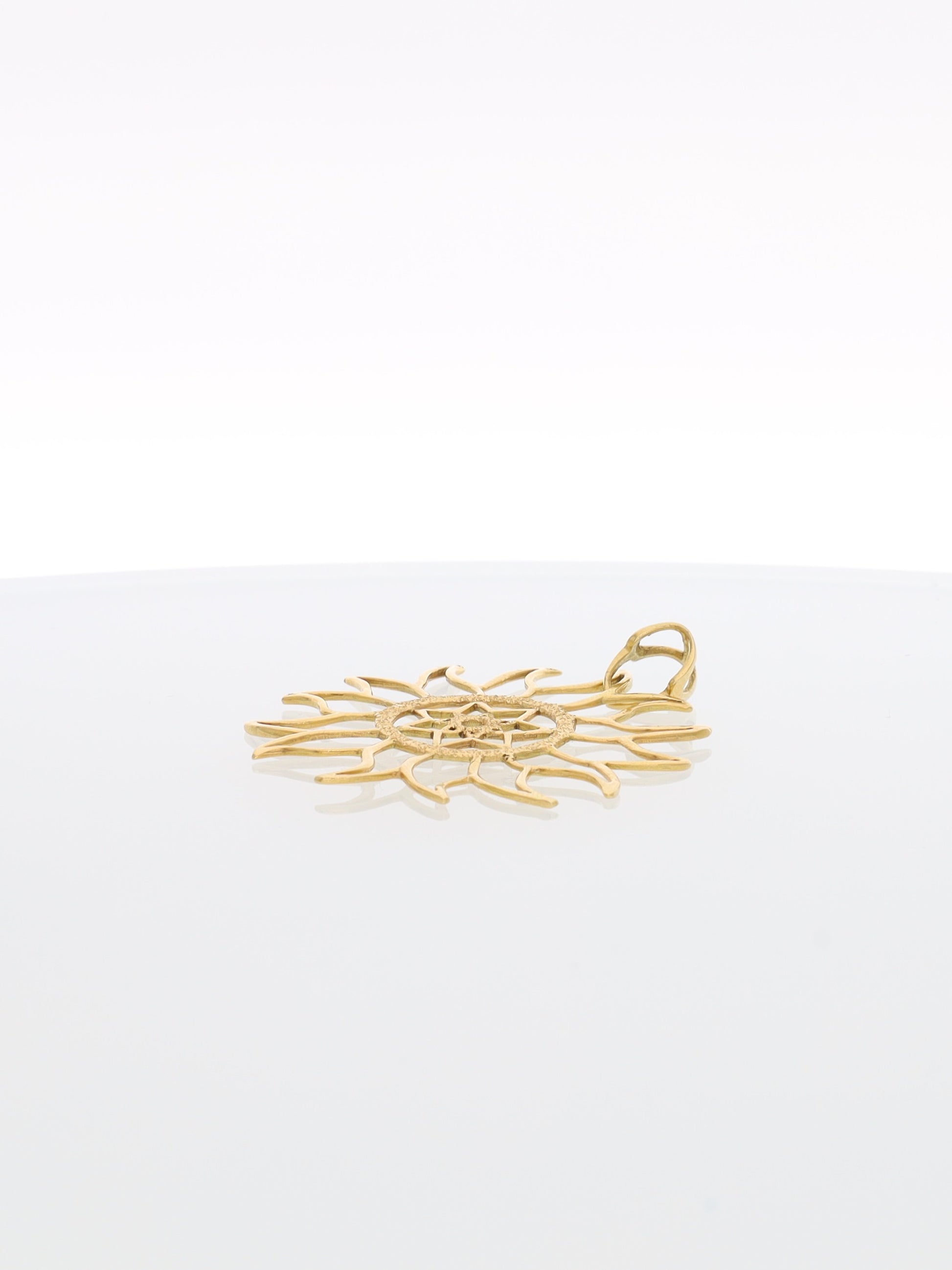 Ciondolo Sole fiammante in Oro Giallo 18 kt