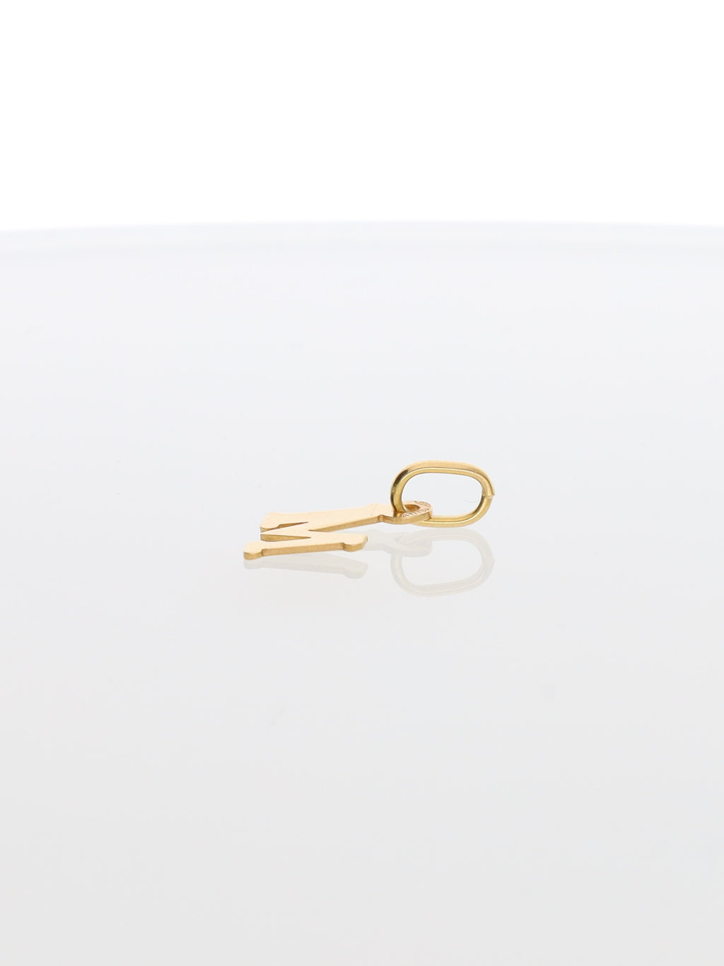 Ciondolo lettera M in oro giallo 18kt - squadrata
